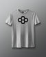 A gray t-shirt with a white quadhex graphic design on the front and a smaller hexagonal logo on the left sleeve.