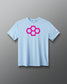 A gray t-shirt with a white quadhex graphic design on the front and a smaller hexagonal logo on the left sleeve.