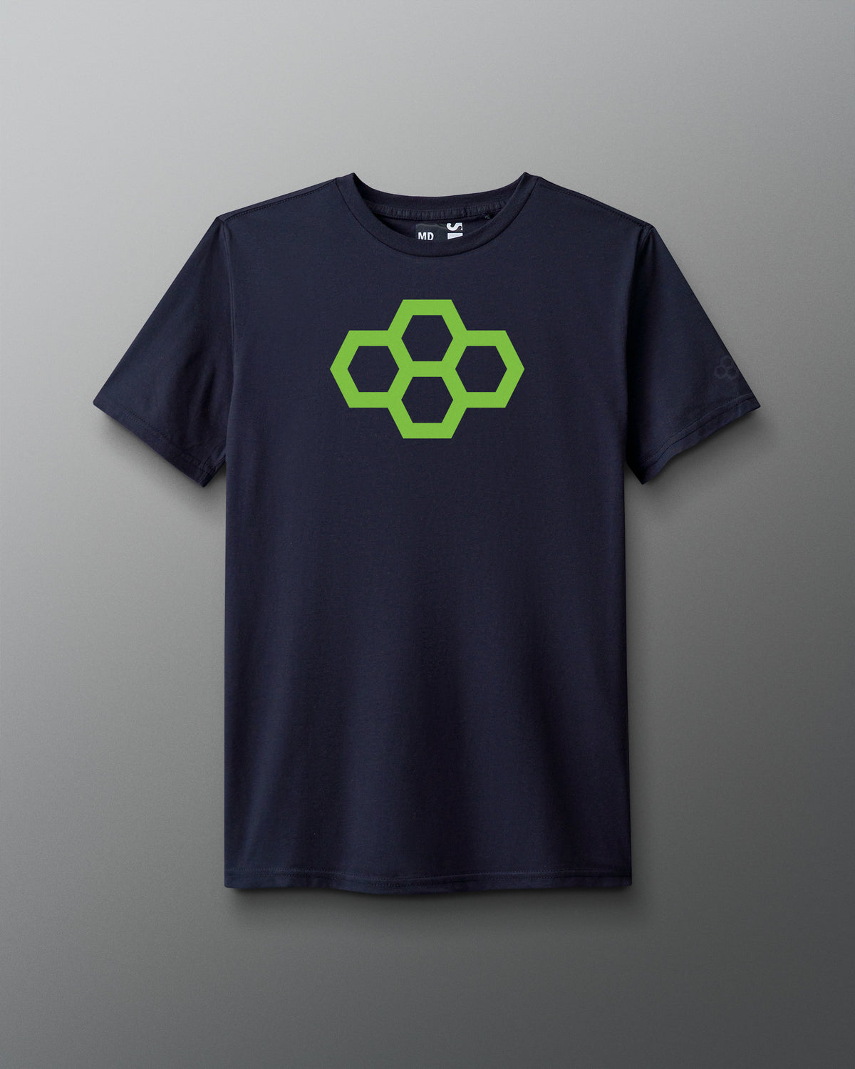 A gray t-shirt with a white quadhex graphic design on the front and a smaller hexagonal logo on the left sleeve.