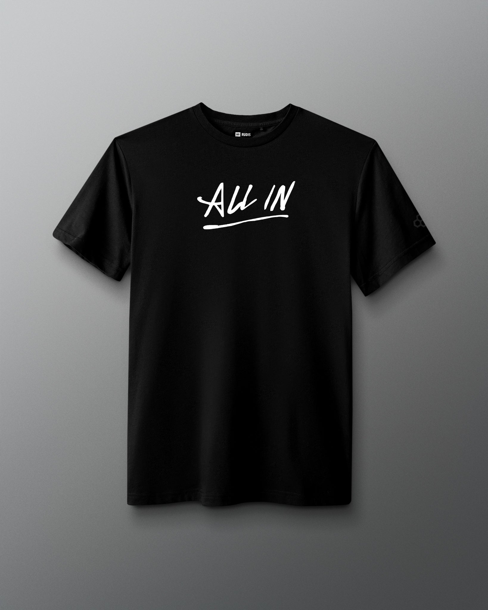Front view of a black T-shirt with the phrase ‘ALL IN’ printed in bold white handwritten-style lettering across the chest, with an underline.