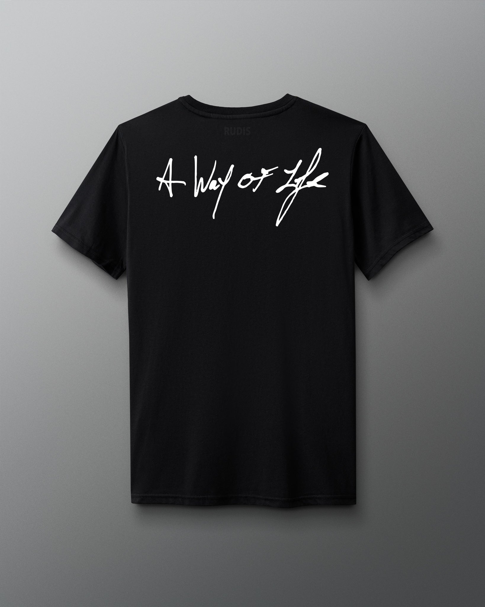 Back view of a black T-shirt with the phrase ‘A Way of Life’ printed in large white handwritten-style script across the upper back.