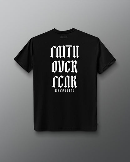 Back view of a black T-shirt featuring bold white gothic-style text that reads ‘Faith Over Fear Wrestling’ stacked vertically.