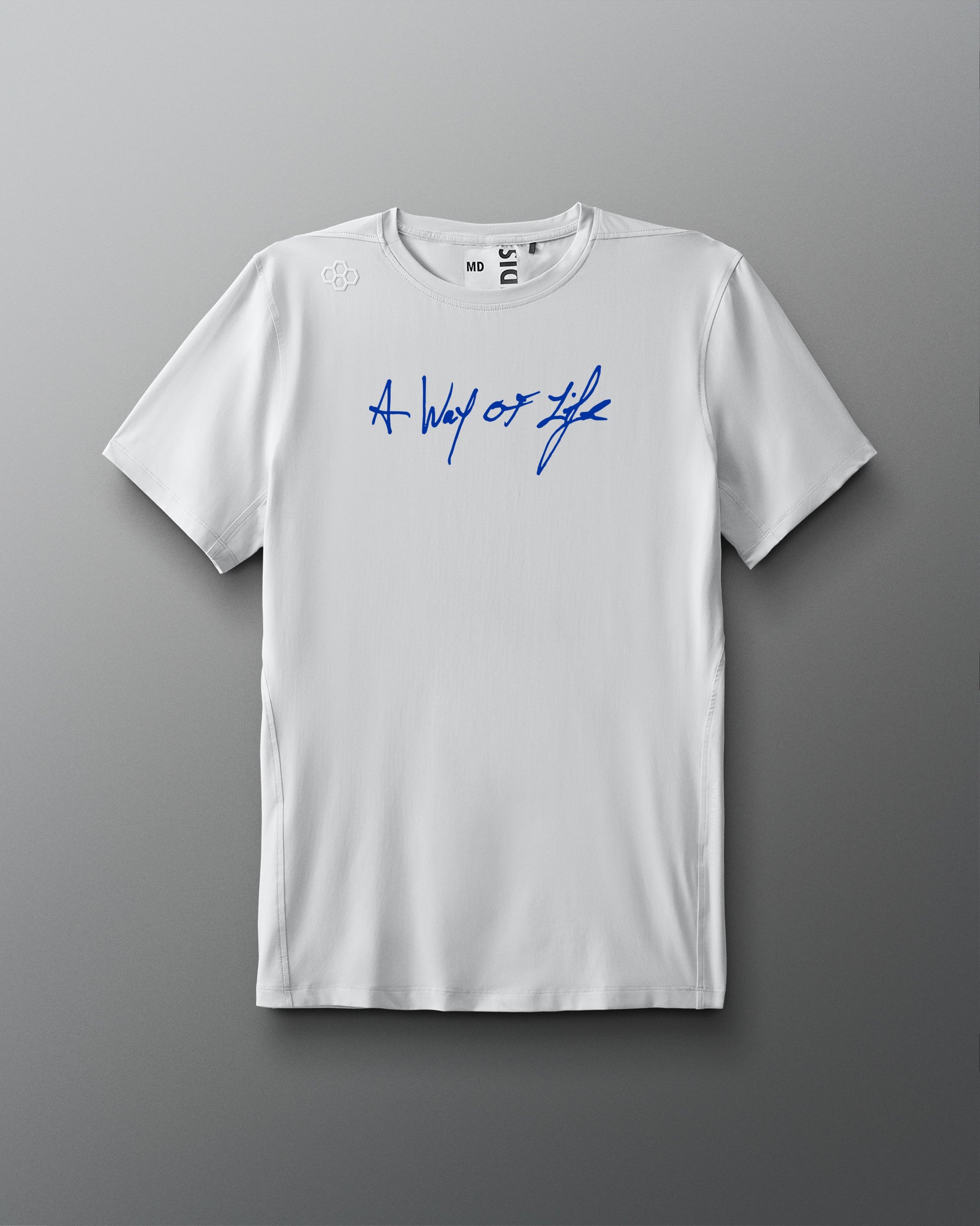 A white performance t-shirt with the text 'A Way of Life' written in a cursive script in blue across the chest.