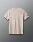 Beige t-shirt on a gray background