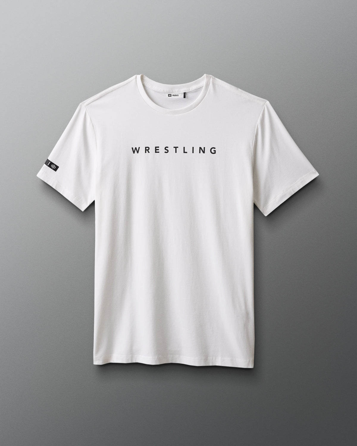 White t-shirt with 'WRESTLING' text on a gray background