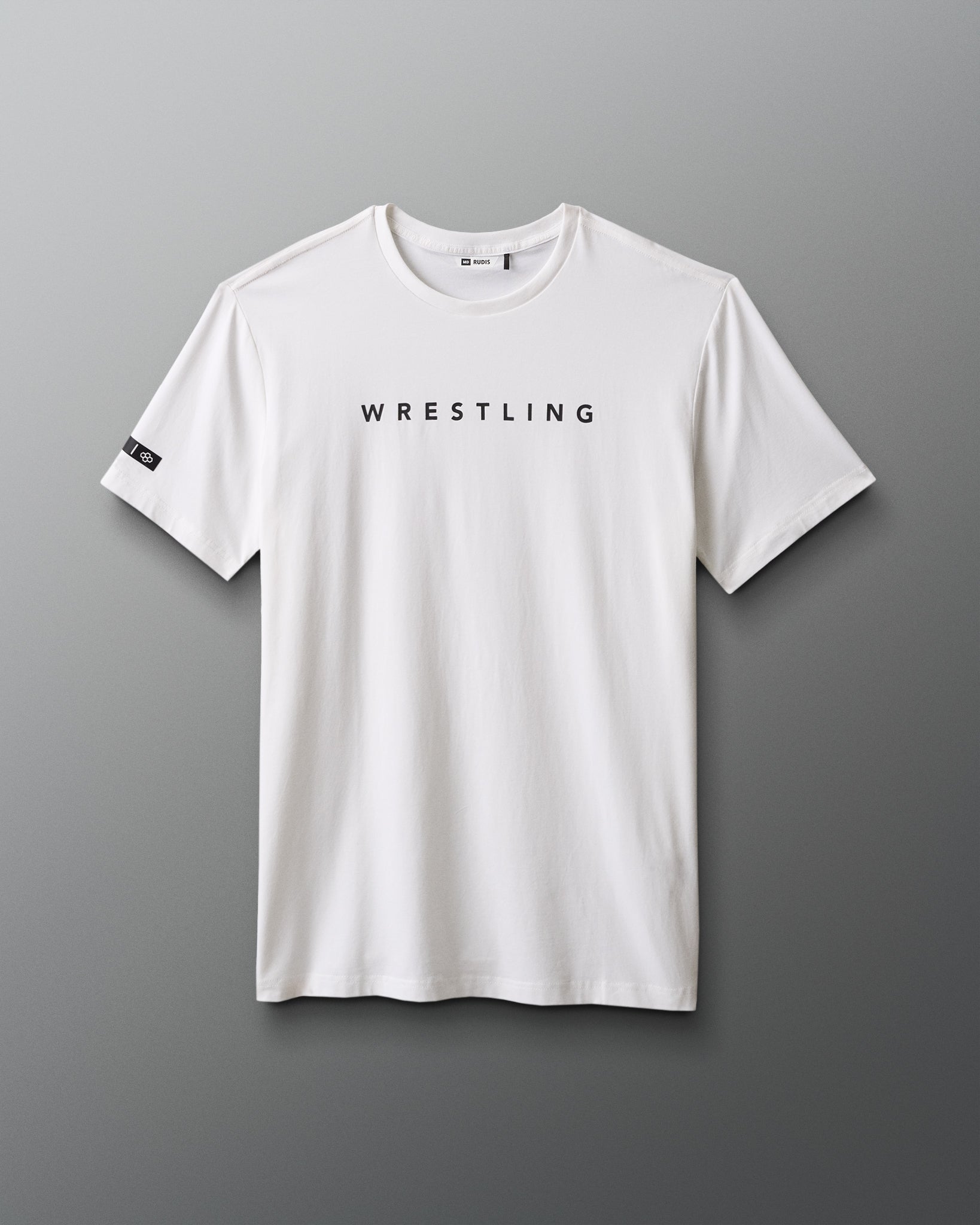 White t-shirt with 'WRESTLING' text on a gray background