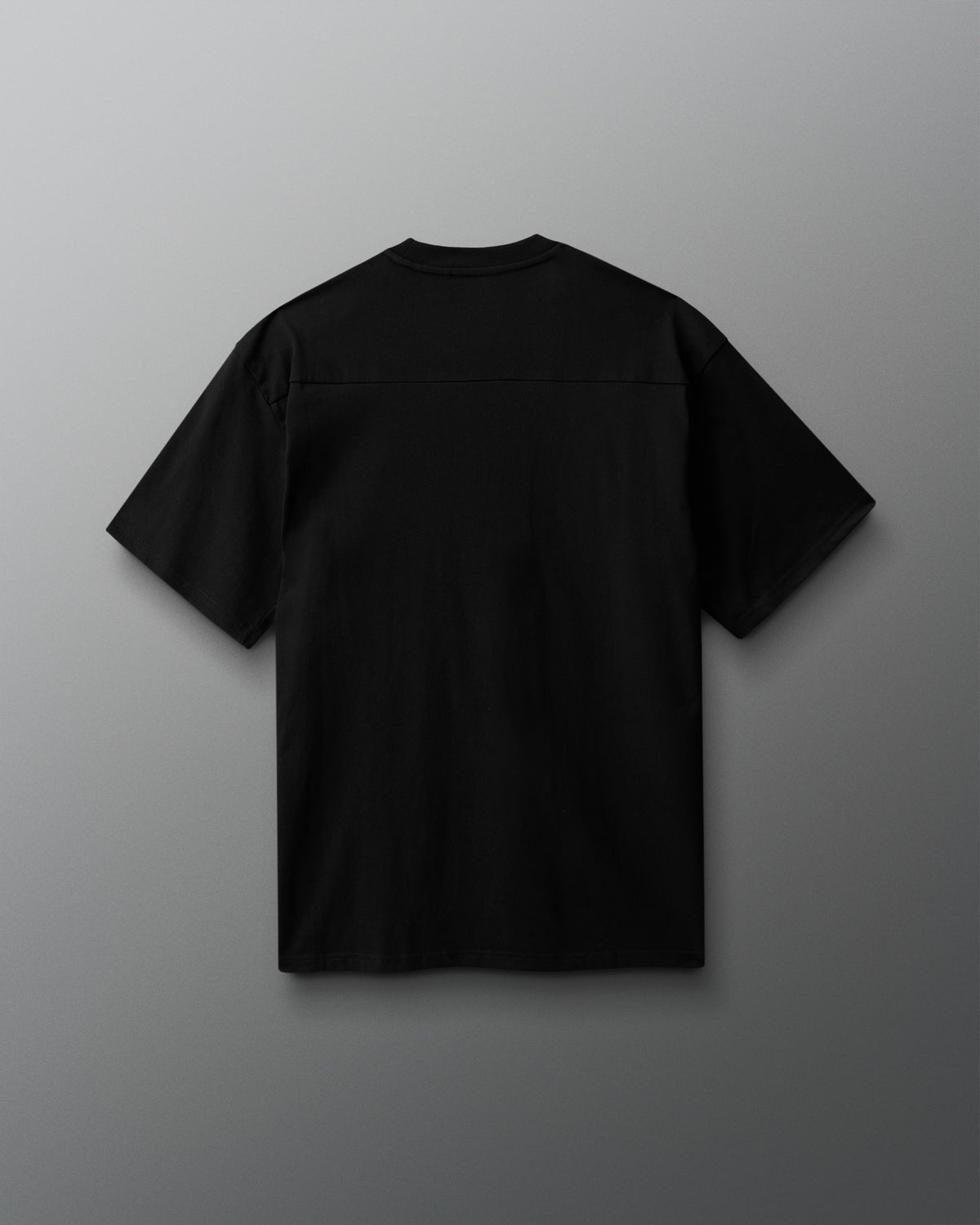 Black t-shirt on a gray background
