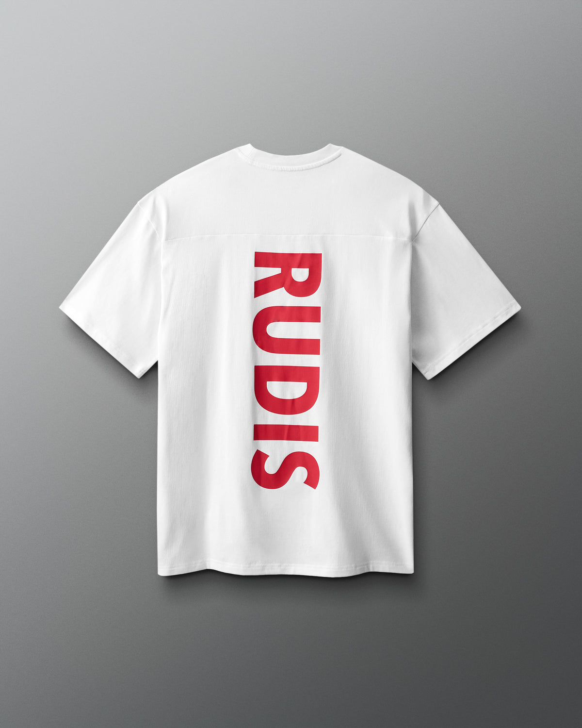 White t-shirt with red 'RUDIS' logo on a gray background