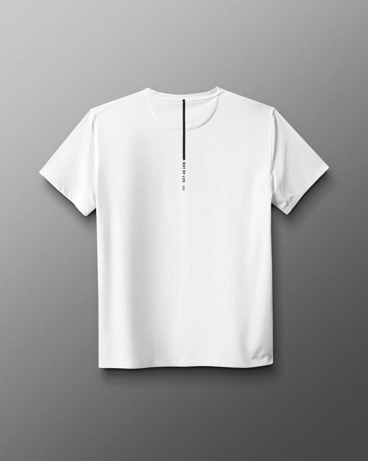 White t-shirt with a small black logo on a gray background