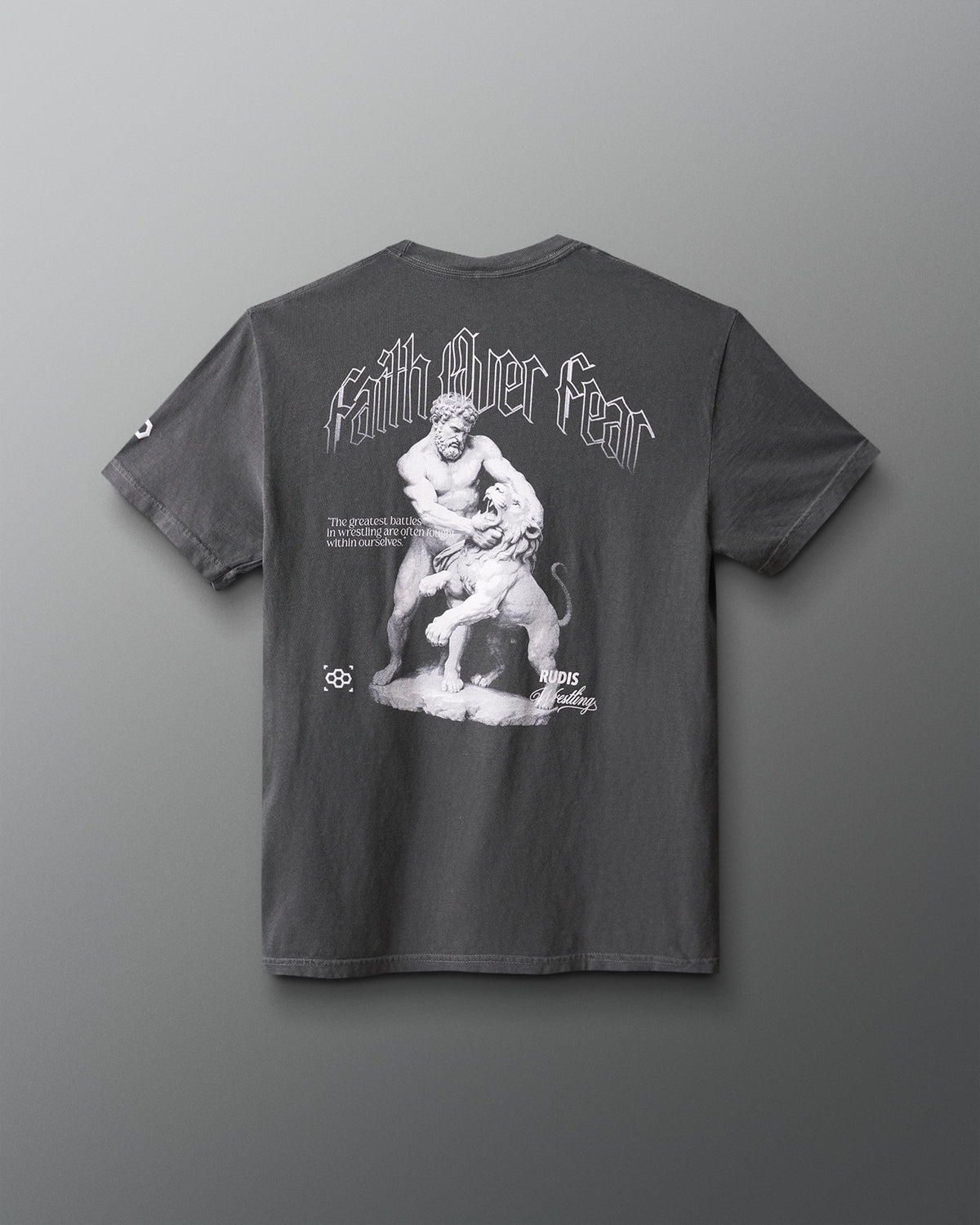 Gray t-shirt with a graphic design on the back against a gray background