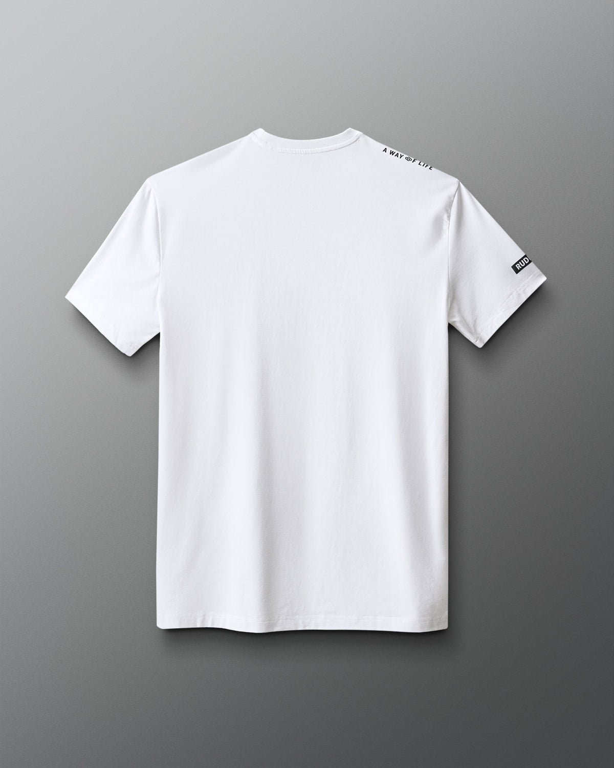 White t-shirt with a brand logo on the sleeve against a gray background