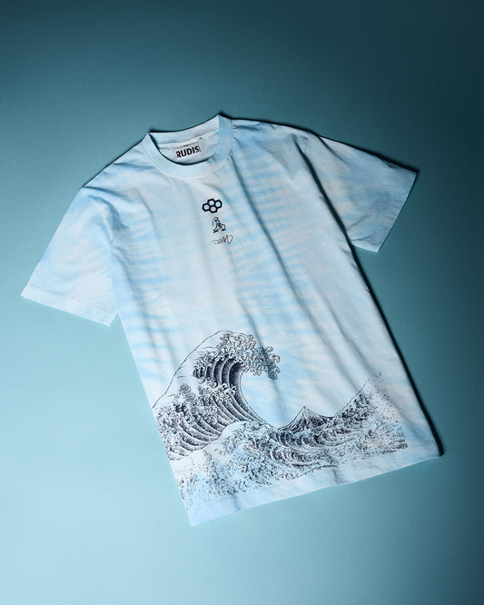 RUDIS Samurai Ikigai Classic Cotton T-Shirt in blue tie-dye, laid flat with Japanese-inspired wave artwork, subtle chest graphics, and RUDIS branding.