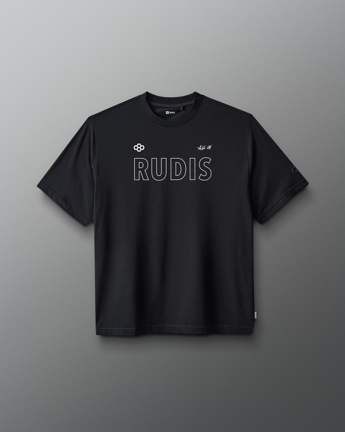 A black short-sleeve crewneck t-shirt with 'RUDIS' printed in white outline text across the chest, displayed against a dark gray gradient background.