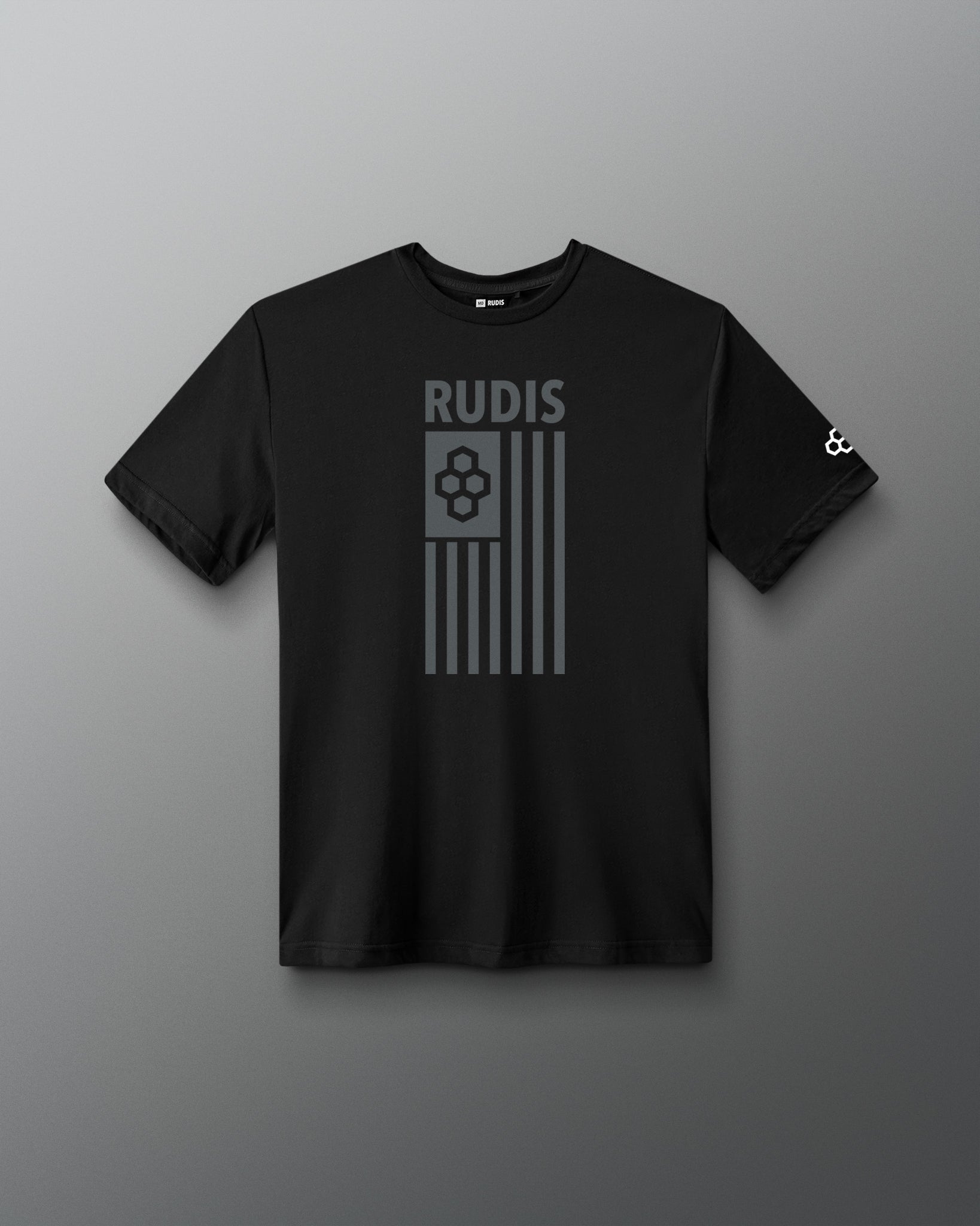 A black short-sleeve crewneck t-shirt with a gray graphic on the front featuring the word 'RUDIS' above a stylized flag design, displayed against a dark gray gradient background.