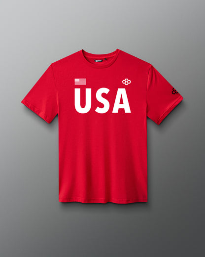 Front view of RUDIS USA Elite Super Soft T-Shirt in red, featuring bold white USA lettering, American flag graphic, RUDIS Hex logos, and crewneck design.