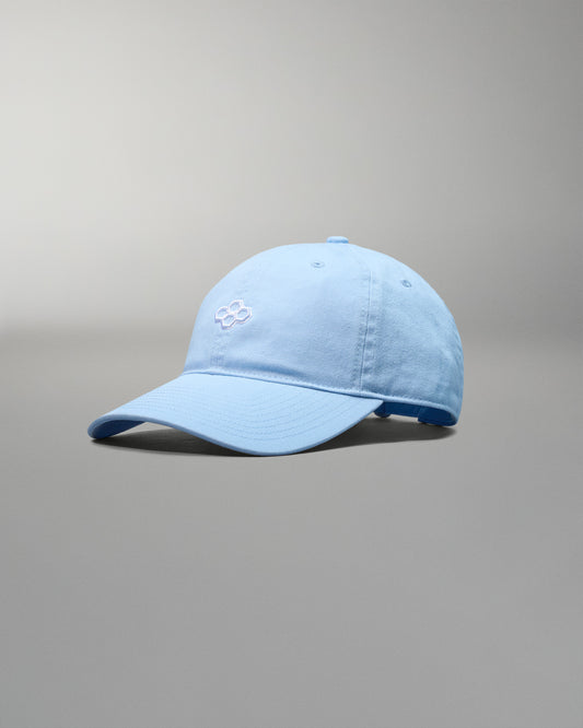 Light blue baseball cap on a gray background