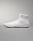 A white high-top athletic shoe with a breathable mesh upper and padded collar for support against a neutral background.