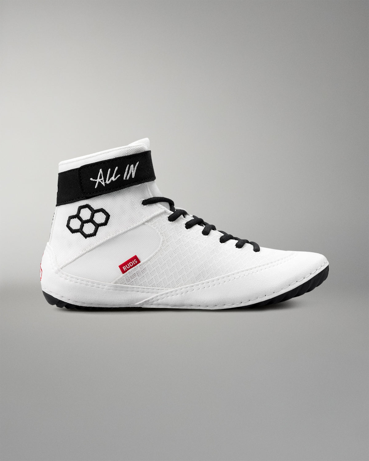 White wrestling shoe with black accents on a gray background
