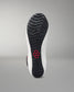 Sole of a wrestling shoe with a brand logo on a gray background