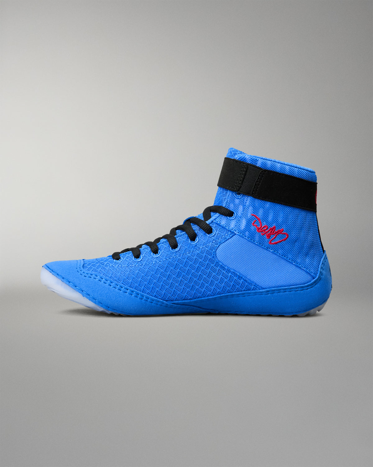 Opposite side view of RUDIS Samurai Speed Ikigai wrestling shoe highlighting blue mesh construction, black laces, and red embroidered signature.