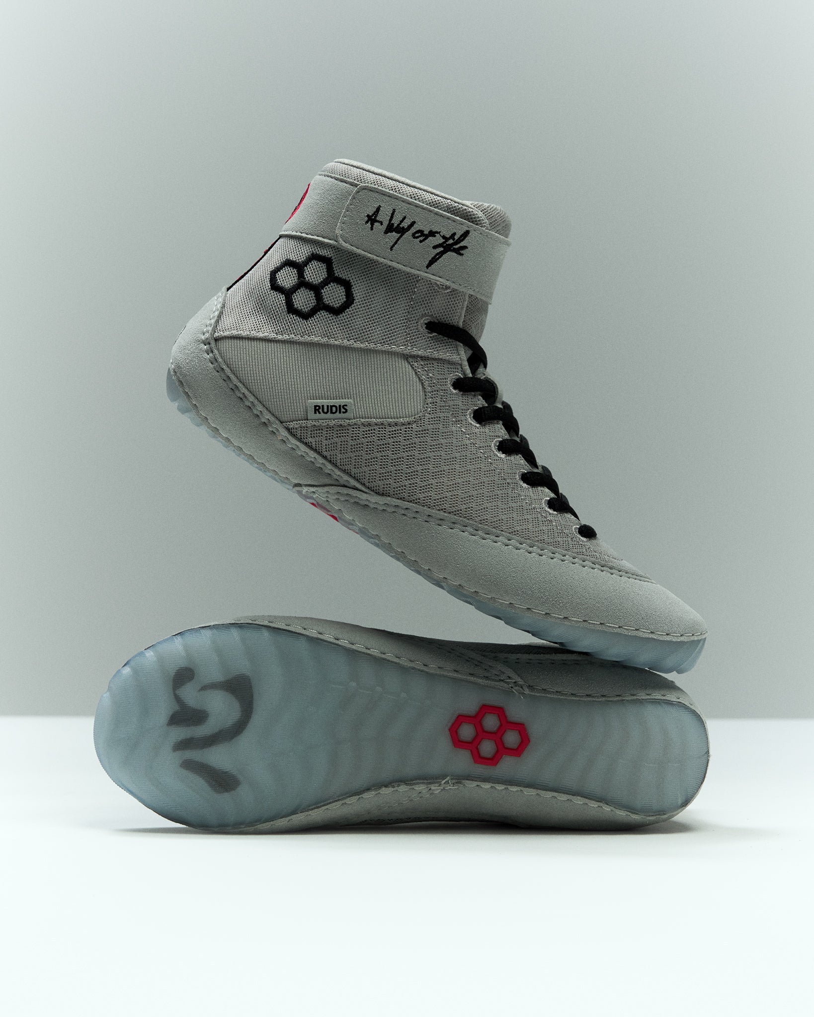 RUDIS Samurai Speed Adult Wrestling Shoes in Kokoro, featuring light gray mesh uppers, black laces, ankle straps, and translucent outsoles with red RUDIS detailing.