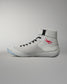 Medial side view of the RUDIS Samurai Speed Kokoro wrestling shoe, showcasing black laces, textured gray panels, ankle strap, and red embroidered signature detail.