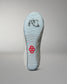 Bottom view of the RUDIS Samurai Speed Kokoro wrestling shoe, highlighting the translucent light blue outsole, textured traction pattern, and red RUDIS emblem.