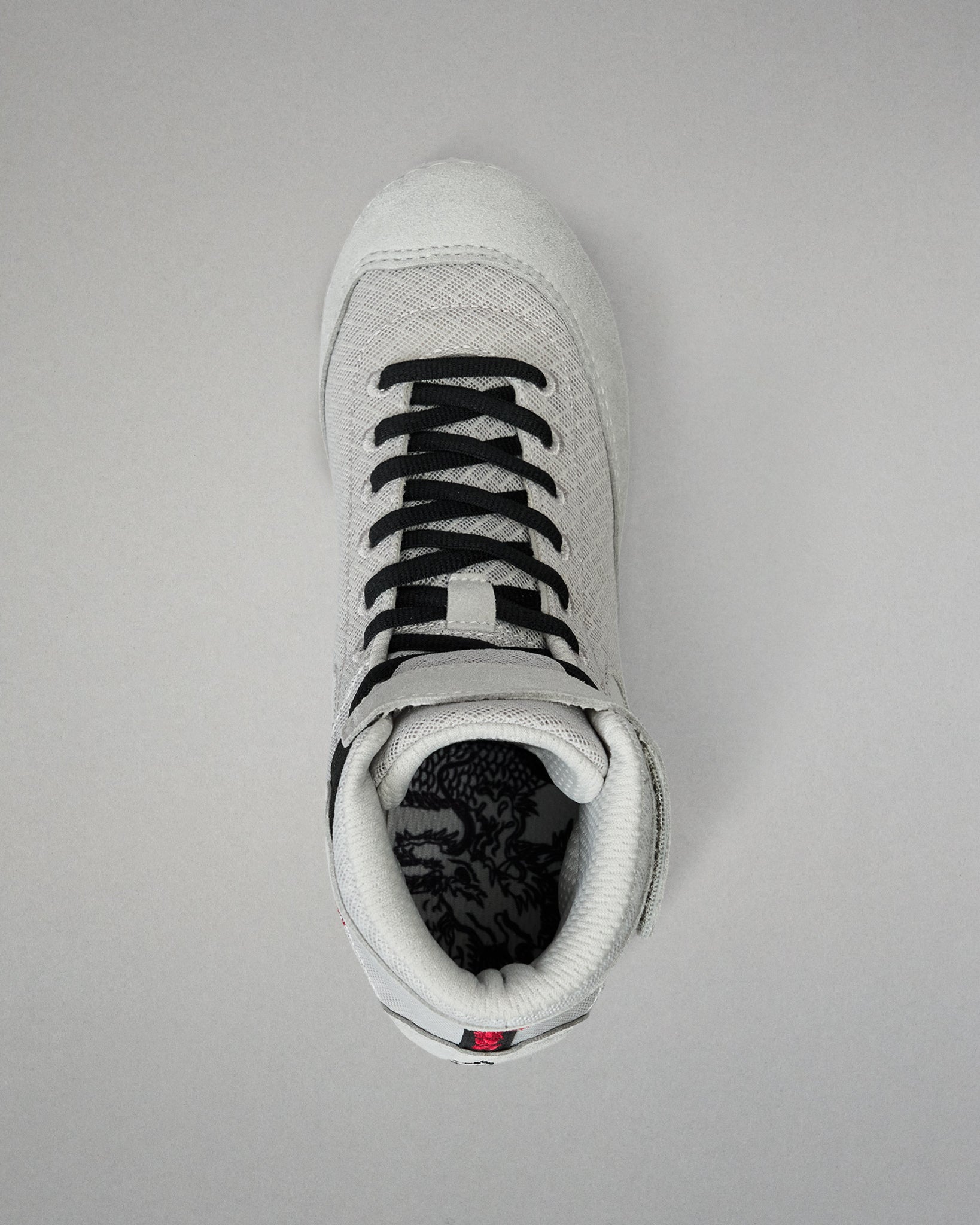 Top-down view of the RUDIS Samurai Speed Kokoro wrestling shoe, showing black laces, padded ankle collar, gray mesh upper, and detailed interior footbed artwork.