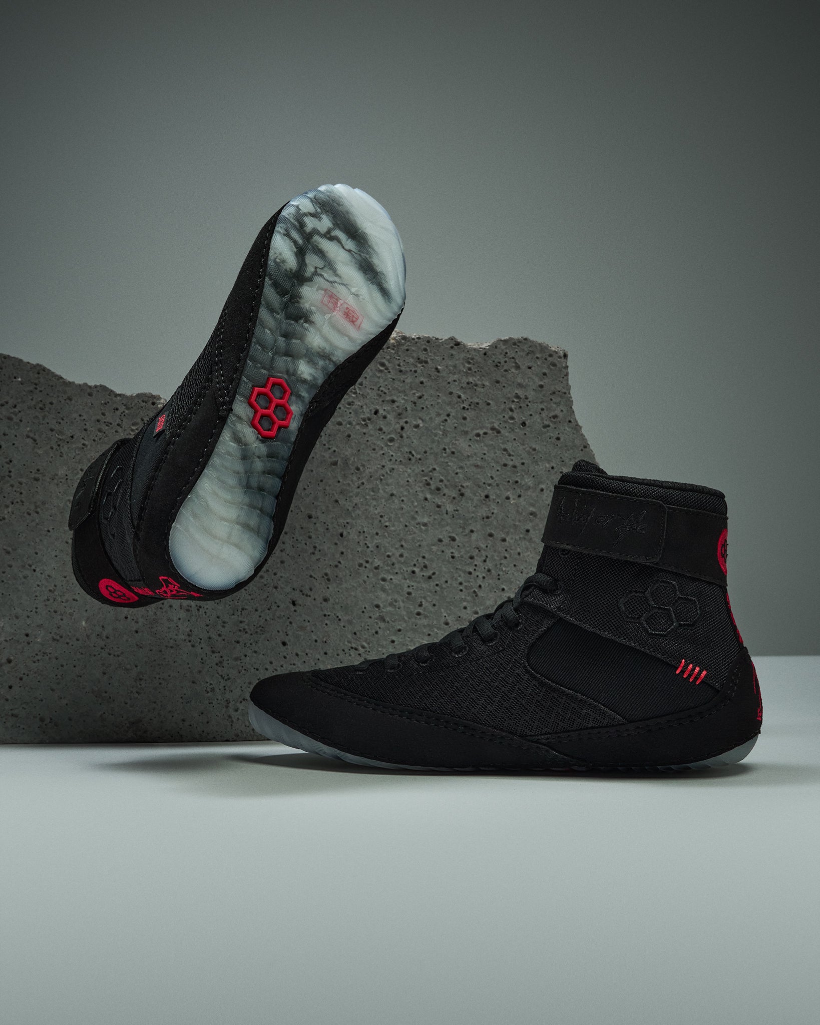 RUDIS Samurai Speed Adult Wrestling Shoes in Wabi-Sabi black with red accents, showing a side profile and translucent outsole with Japanese landscape artwork.