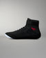 Inner side view of the RUDIS Samurai Speed Wabi-Sabi wrestling shoe in black, showing textured mesh, red embroidered signature, ankle strap, and translucent outsole.