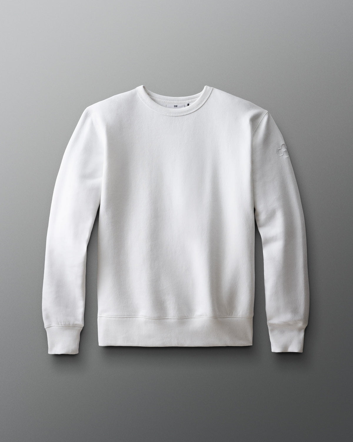 A white crewneck fleece sweatshirt displayed against a neutral background.