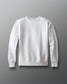 A white crewneck fleece sweatshirt displayed against a neutral background.
