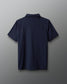 Navy blue shirt on a gray background
