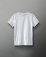 A light gray athletic shirt with a round neck and short sleeves features a subtle logo on the shoulder, designed for sports or casual use.