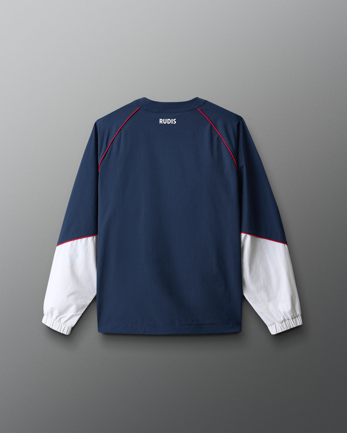 Navy and white long-sleeve shirt with 'RUDIS' branding on a gray background