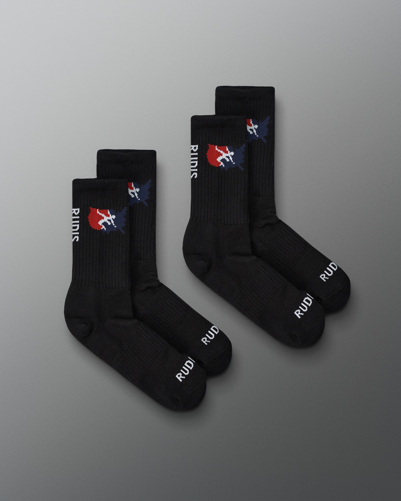 Set of black socks with a logo on a gray background