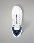 White wrestling shoe with blue lining on a gray background