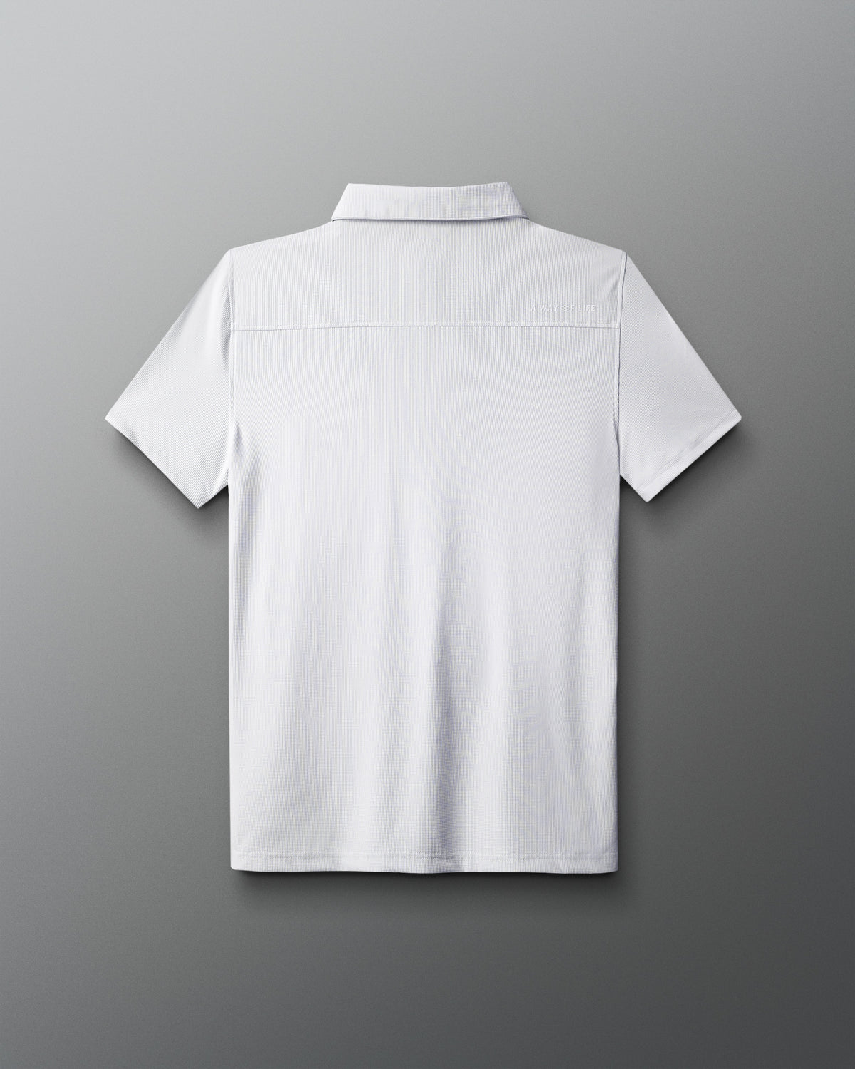 back of white polo shirt