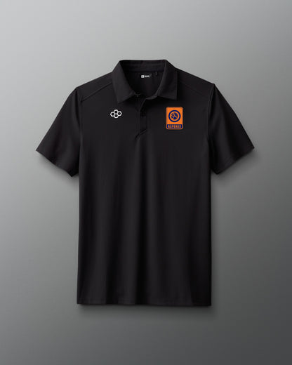 Black polo shirt with logos on a gray background