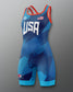 Blue freestyle wrestling singlet with 'USA' text on a gradient red to blue background