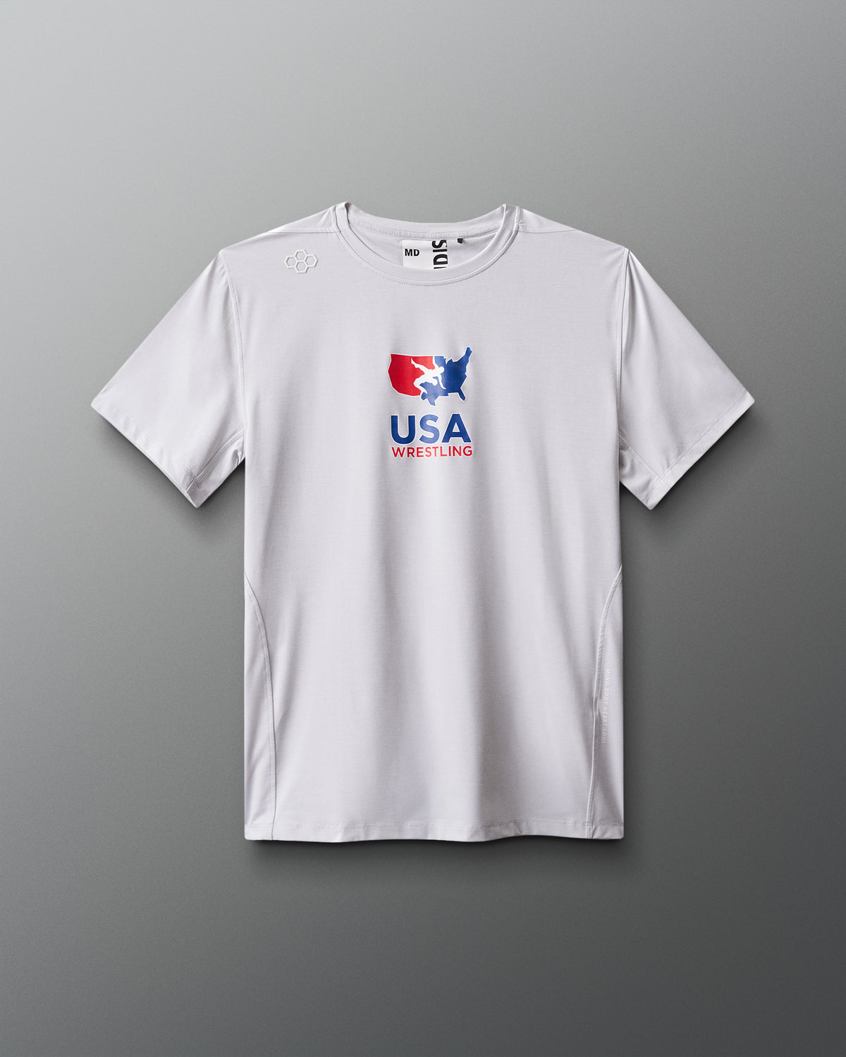 White t-shirt with USA Wrestling logo on a gray background