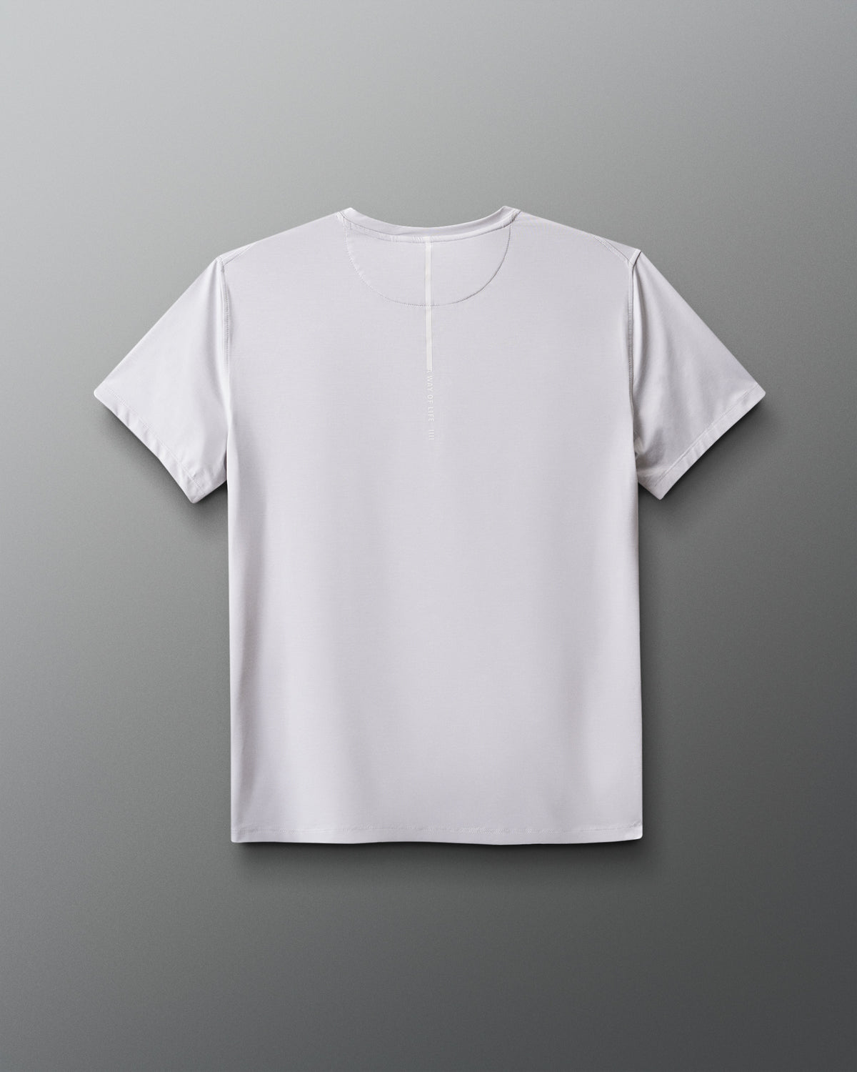 White t-shirt on a gradient blue to red background