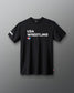 Black t-shirt with 'USA Wrestling' logo on a gray background