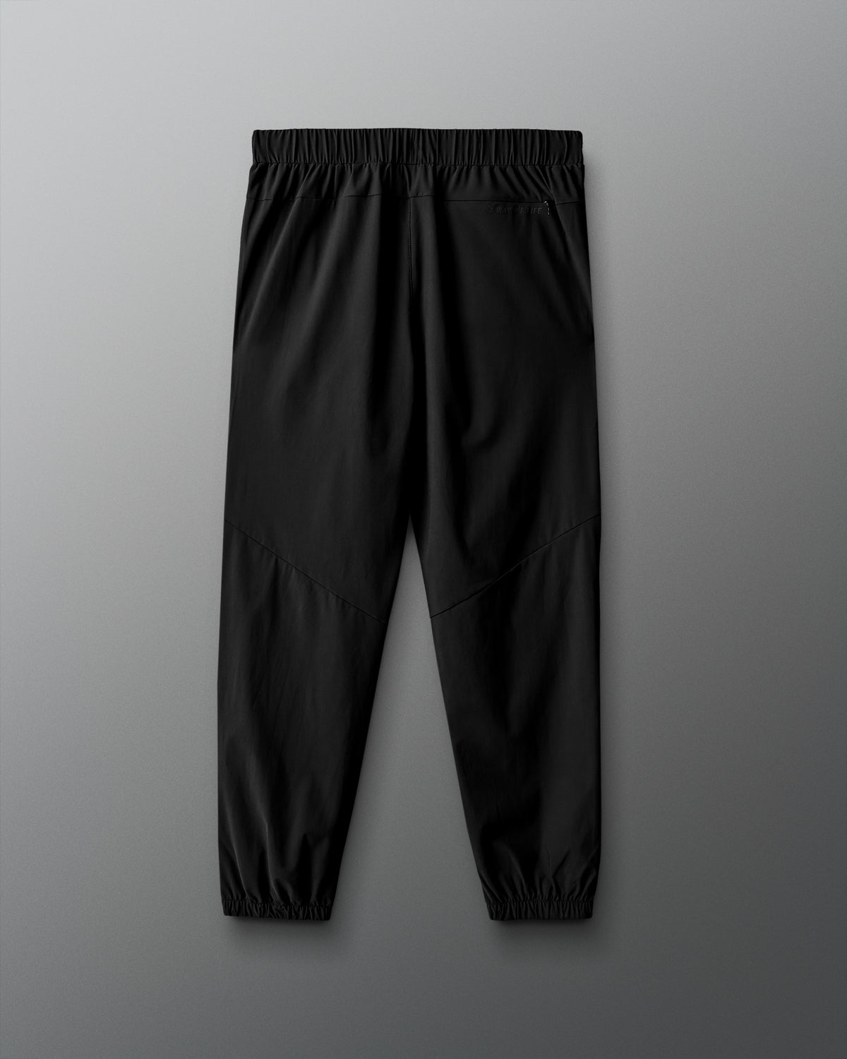 Black pants on a gray background