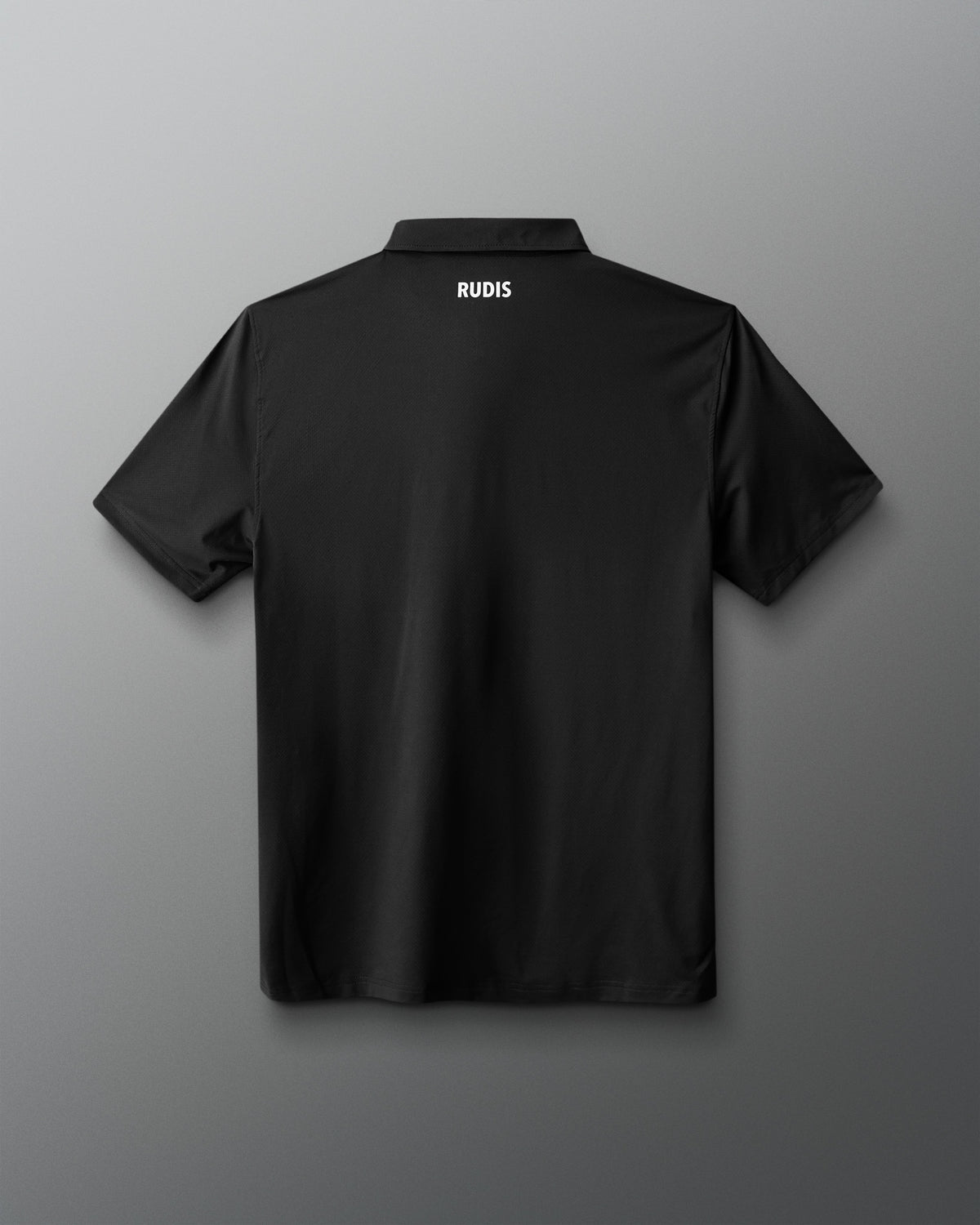 Black polo shirt with 'RUDIS' branding on the back against a gray background