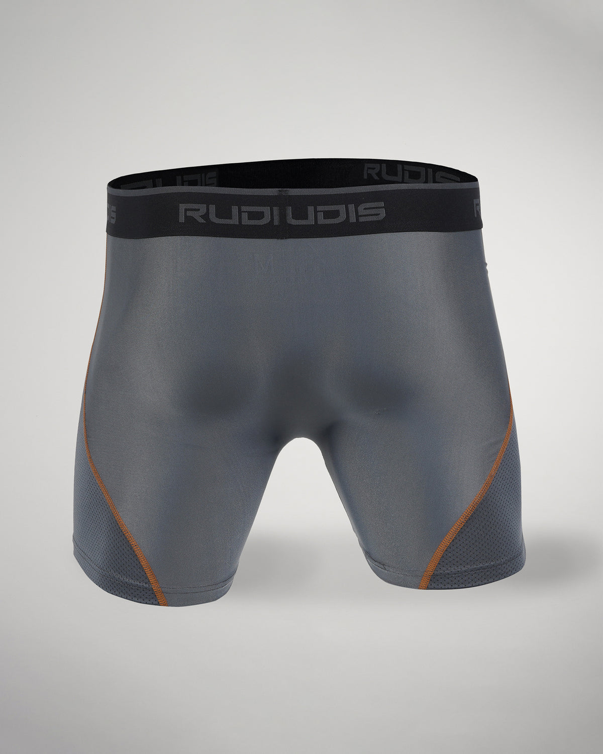 These athletic shorts feature a sleek gray design with a breathable construction and contrasting orange stitching for added style