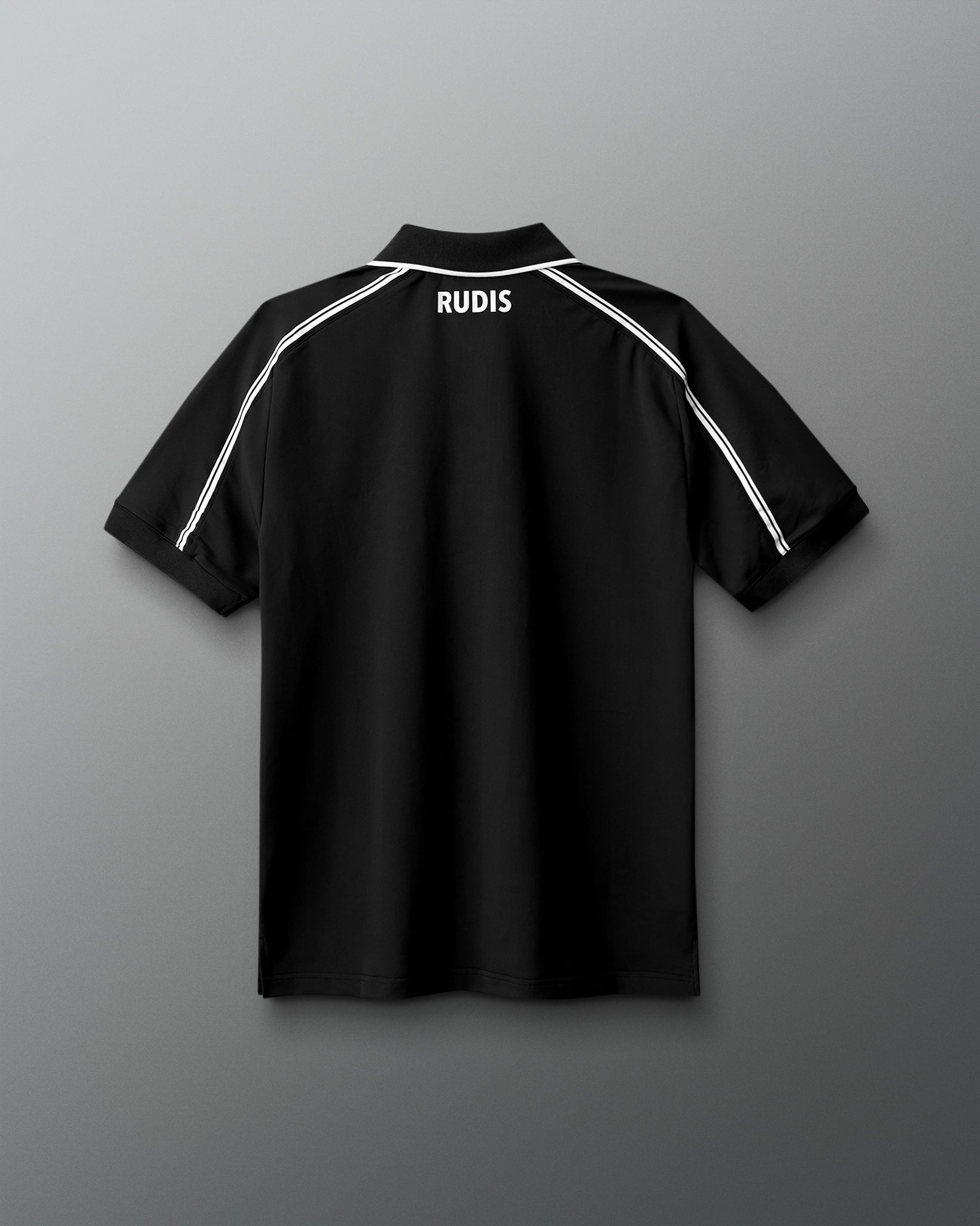 Black polo shirt with 'RUDIS' branding on a gray background