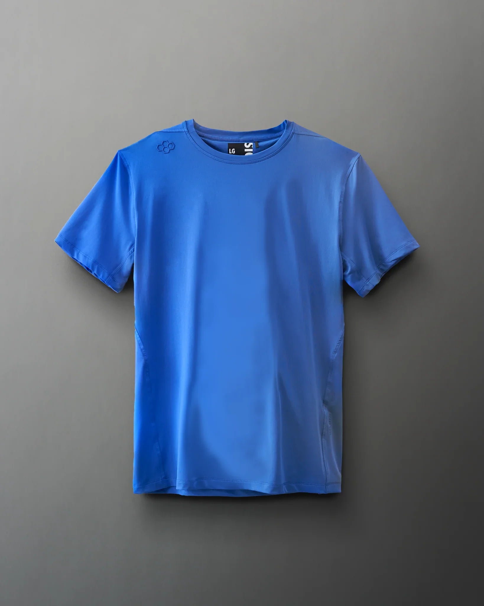 A vibrant blue athletic t-shirt with a round neck and short sleeves, made from smooth, breathable fabric, featuring a logo on the shoulder.