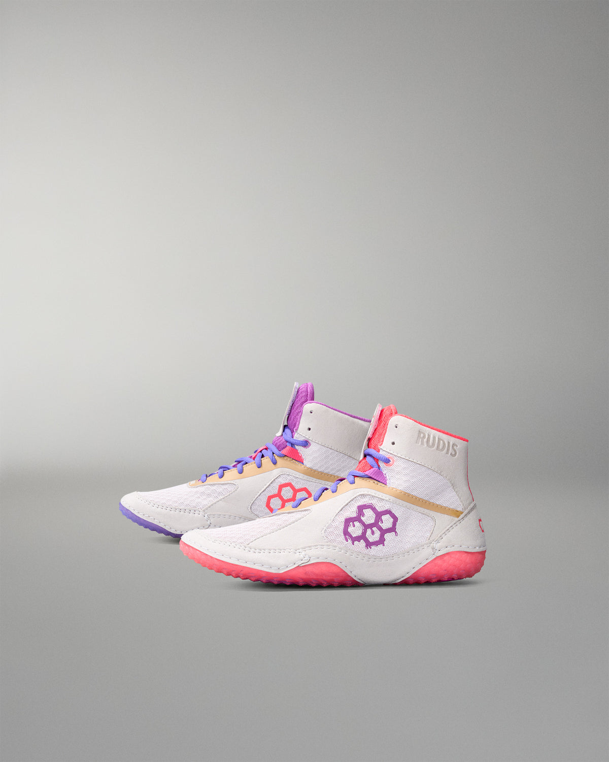 White wrestling shoes with colorful accents on a gray background