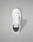 White wrestling shoe on a gray background